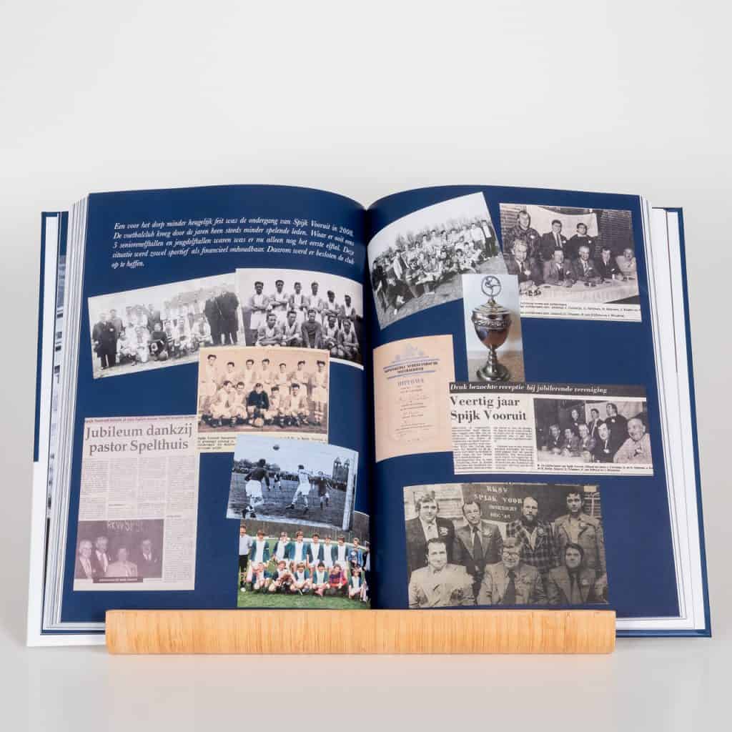 Open boek met historische foto's en documenten over 't Gelders Eiland.